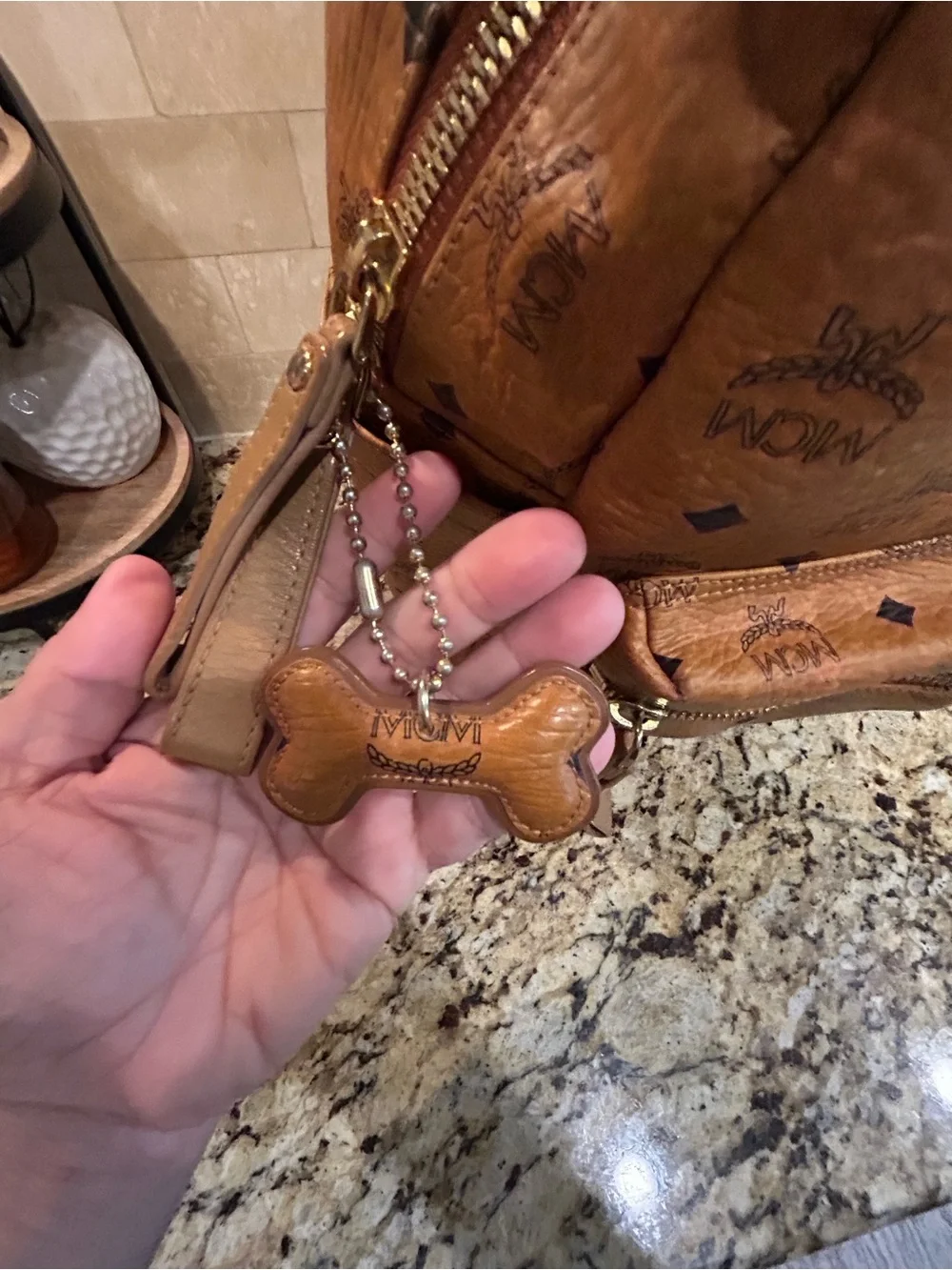 MCM Cognac Visetos Backpack Large with mcm bone bag charm and coa card.